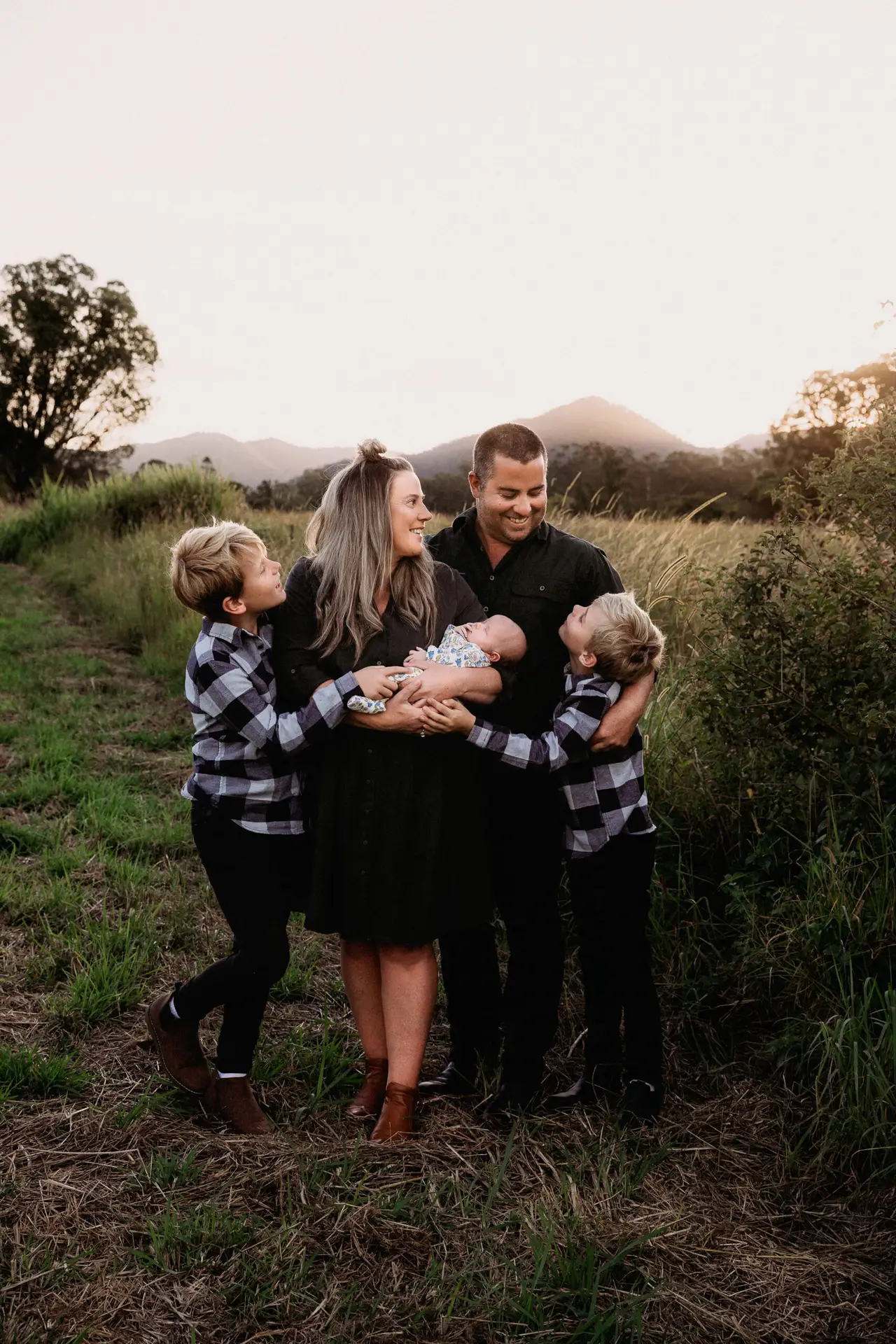 Family photo with mountain backdrop